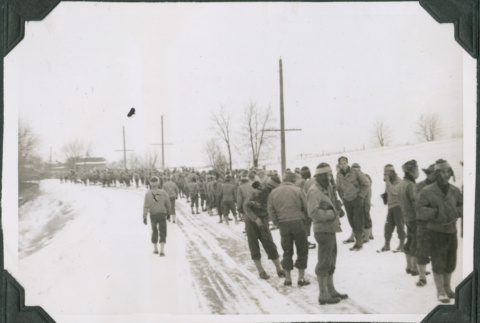 Men walking on road in snow (ddr-ajah-2-447)