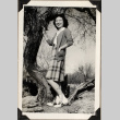 Woman standing by tree (ddr-densho-587-50)