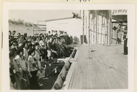 Musicians perform at a Girls League convention (ddr-densho-37-1123)