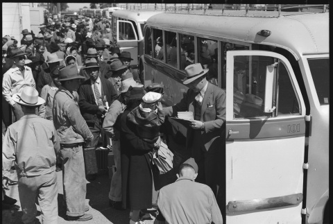 Japanese Americans boarding bus (ddr-densho-151-142)