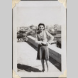 Woman standing on rooftop (ddr-densho-466-828)