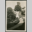 Girl poses in garden (ddr-densho-359-519)
