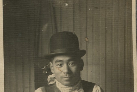 Issei man in his store (ddr-densho-124-17)