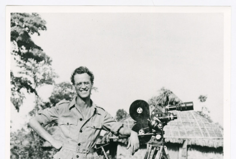 David Quaid with video camera (ddr-densho-1007-333)