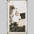 Woman holding a baby (ddr-densho-321-1086)