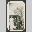 couple holding baby and dessert (ddr-densho-378-523)