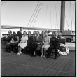 Group photo of passengers on board ship (ddr-densho-426-258)