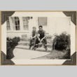 Roy Sumida and another man seated on steps (ddr-densho-542-457)