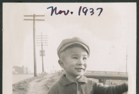 Photo of a toddler in a jacket and hat (ddr-densho-483-706)