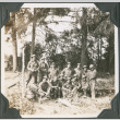 Group of men in uniform posing by trees (ddr-ajah-2-231)