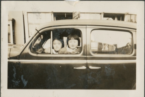 Two girls in a car (ddr-densho-321-778)