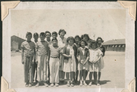 Group photo of young adults in camp (ddr-densho-321-38)