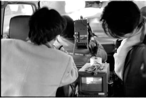 Behind the scenes shot in car (ddr-densho-1007-1164)