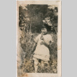 Girl standing in garden (ddr-densho-426-1440)