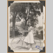 Girl with a bicycle (ddr-densho-542-203)