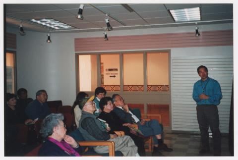 Tom Ikeda giving presentation to audience at Civil Liberties Celebration (ddr-densho-506-6)