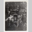 Family in front of car (ddr-densho-259-681)
