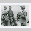 Soldier Joseph Barabas talks to Okinawan children (ddr-densho-1007-87)