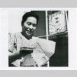 Woman receiving letter (ddr-densho-1007-342)
