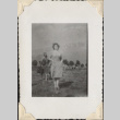 Woman standing in field (ddr-densho-466-750)
