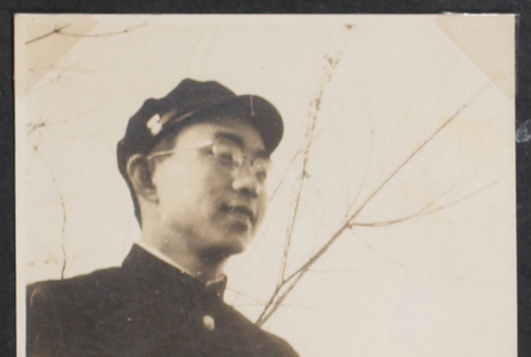 Young man in Japanese school uniform (ddr-densho-468-325)