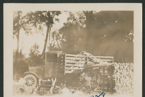 truck and wood pile (ddr-densho-378-469)