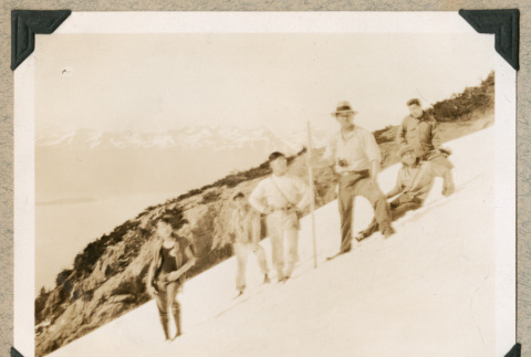 Men hiking up snowy mountain (ddr-densho-383-54)