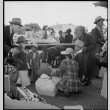 Japanese American family with baggage (ddr-densho-151-289)