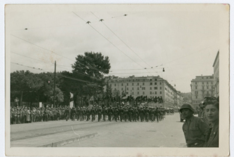 Soldiers marching by through city street (ddr-densho-368-91)