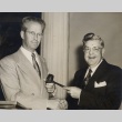 Urban E. Wild and another man holding a gavel (ddr-njpa-2-1060)