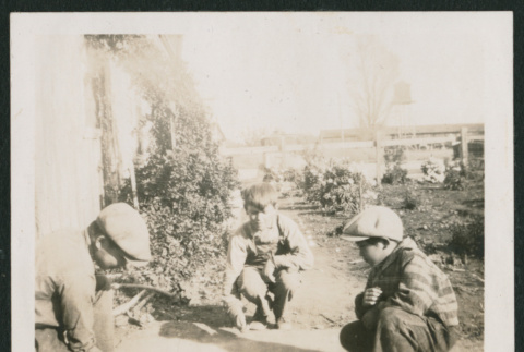 three boys playing outside (ddr-densho-378-364)