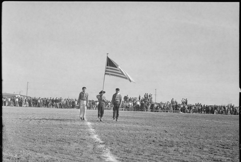 Football game flag ceremony (ddr-densho-37-433)
