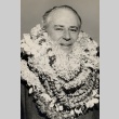 Man wearing leis (ddr-njpa-2-286)