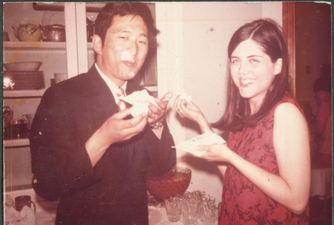 Couple eating cake (ddr-densho-523-525)