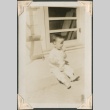 Toddler sitting on a porch step (ddr-densho-321-139)