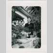 Japanese American family on porch (ddr-densho-26-222)