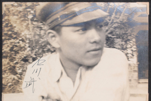Man in hat with kanji (ddr-densho-468-462)