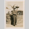 Unidentified man standing by fountain (ddr-densho-423-485)
