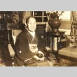 Woman seated in a chair (ddr-njpa-4-2334)