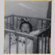 Baby in crib (ddr-densho-522-29)