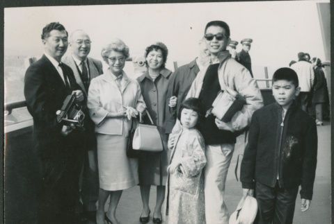 Group photo of 8 people (ddr-densho-523-389)