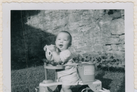 Baby Peter in walker (ddr-densho-462-194)