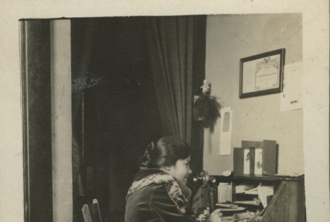 Issei woman using a telephone (ddr-densho-124-11)