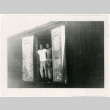 Two men standing in door of boxcar (ddr-densho-122-617)