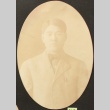 Portrait of Nikkei man in a suit (ddr-densho-259-434)