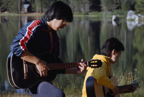 Craig So and Marice Tatsuno playing guitar (ddr-densho-336-1475)