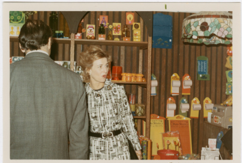 Man and woman by product display (ddr-densho-426-1095)