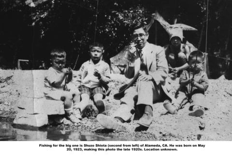 Man sitting with four children, fishing (ddr-ajah-6-867)