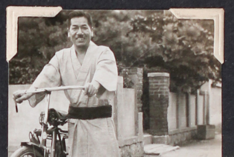 Man with bicycle (ddr-densho-468-469)