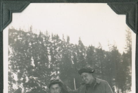 Two men standing in snow (ddr-ajah-2-89)